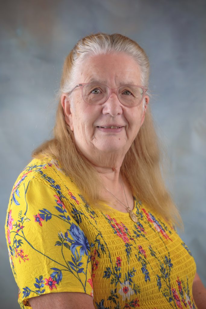 Kathleen Shelson, Religious Education Teacher at All Saints Catholic School, guiding students in faith formation and spiritual development.