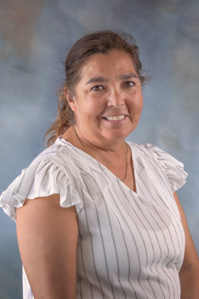 MaryLou Herrera guiding young learners as kindergarten teacher at All Saints Catholic School