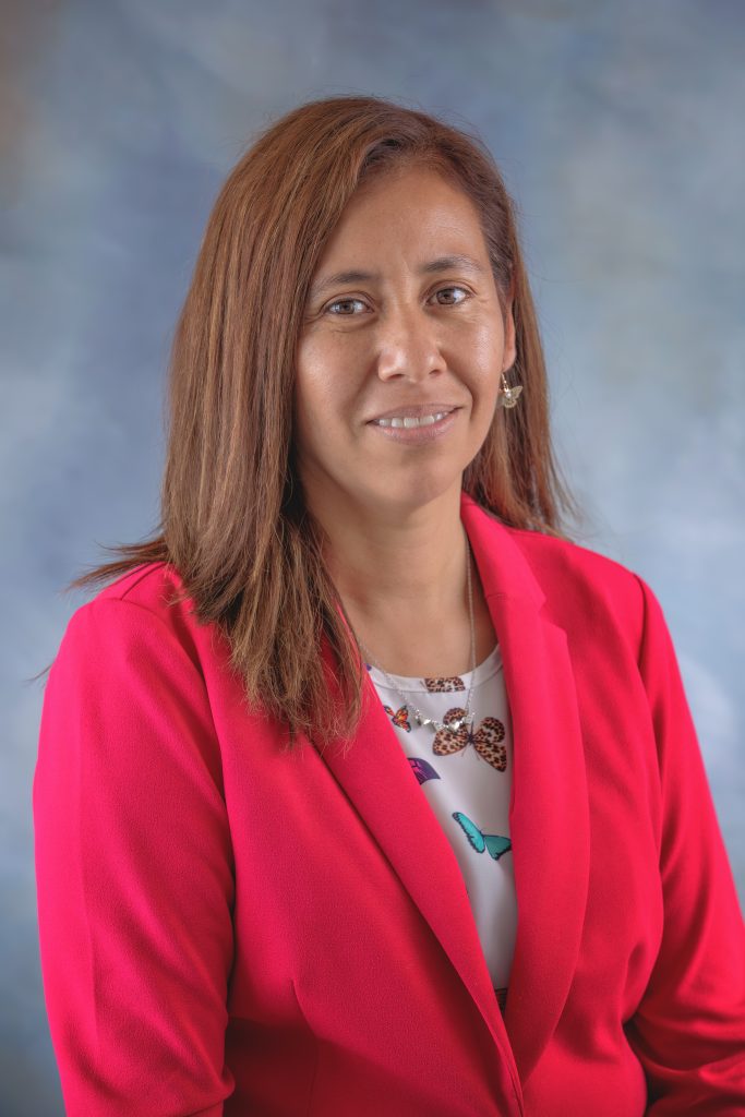 Rosa Kouza-Padilla, Classroom Aide at All Saints Catholic School, supporting student learning and classroom activities.