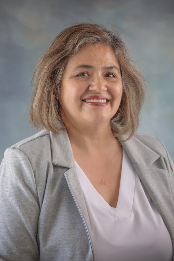 Rosalina Arvisu, Pre-K Aide at All Saints Catholic School, supporting early childhood learning and student development.