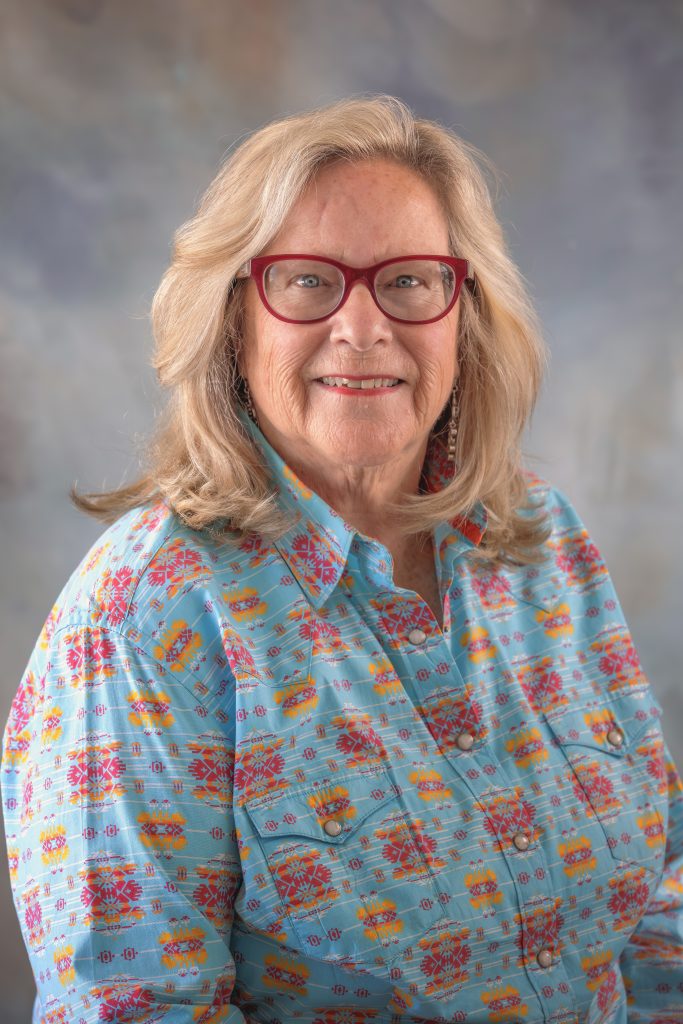 Tonne Myers, After Care Aide at All Saints Catholic School, assisting students after school